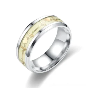 Gold-accented luminous ECG heartbeat ring, single piece side view showing polished silver band with glowing cream inlay and heart motif
