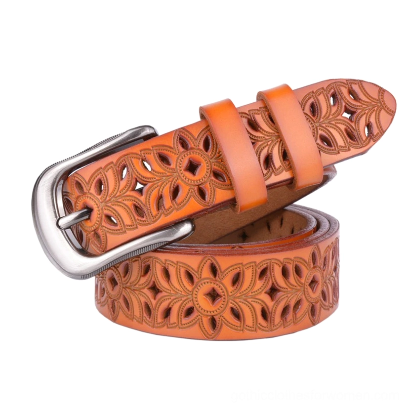 Tan and bright orange genuine leather hollow-carved gothic belts displayed showing symmetrical floral cutout patterns and color variations