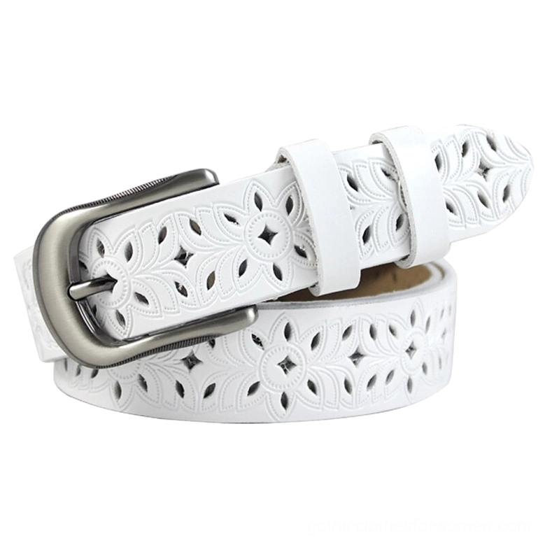 White genuine leather hollow-carved gothic belt with gunmetal pin buckle featuring geometric floral cutout pattern, three-quarter view
