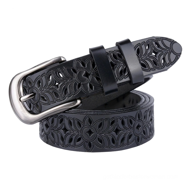 Black genuine leather hollow-carved floral gothic belt with silver pin buckle, three-quarter view showing intricate carved pattern details