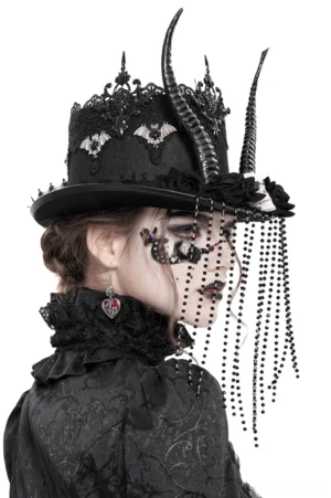 Gothic horned top hat side rear view on model showing beaded veil, bat embroidery details and lace high neck outfit