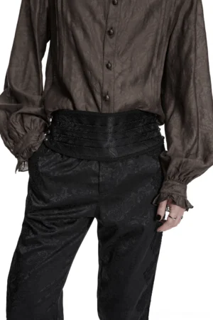 Black jacquard pleated gothic corset belt worn full-body front view on male model with ruffled vintage shirt