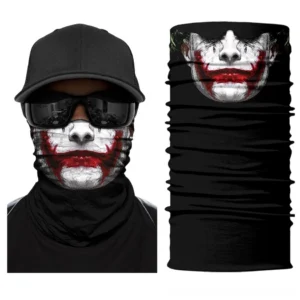 Gothic Joker face gaiter neck cover worn by model with sunglasses and black cap, demonstrating front-facing wear and full design visibility