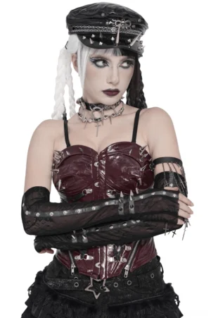 Gothic lace fingerless arm sleeves with spike stud cuffs worn on model with braided hair, front three-quarter view showing sheer black mesh pattern and studded details