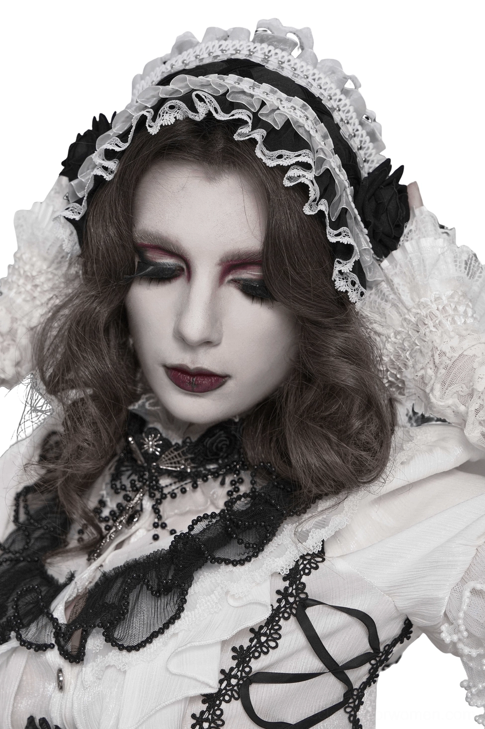 Front close-up view of gothic lace bonnet with vintage lace veil details and sheer ruffles