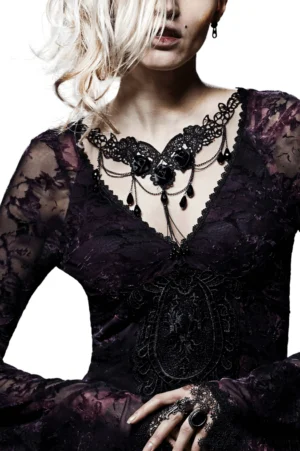 Black gothic lace choker with satin rose embellishments and teardrop pendant chains worn by model, half-body studio shot
