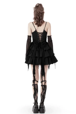 Black gothic dress with lace-up back corset design and metal eyelets, back full-body view on model