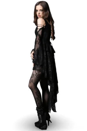 Gothic lace dress styled with rose fishnet stockings and heeled boots, side profile view