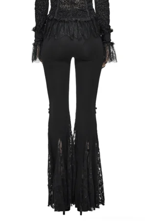 Rear view of high-waisted black gothic lace bell-bottom leggings on model, displaying sheer ruffled lace pant legs and flared silhouette