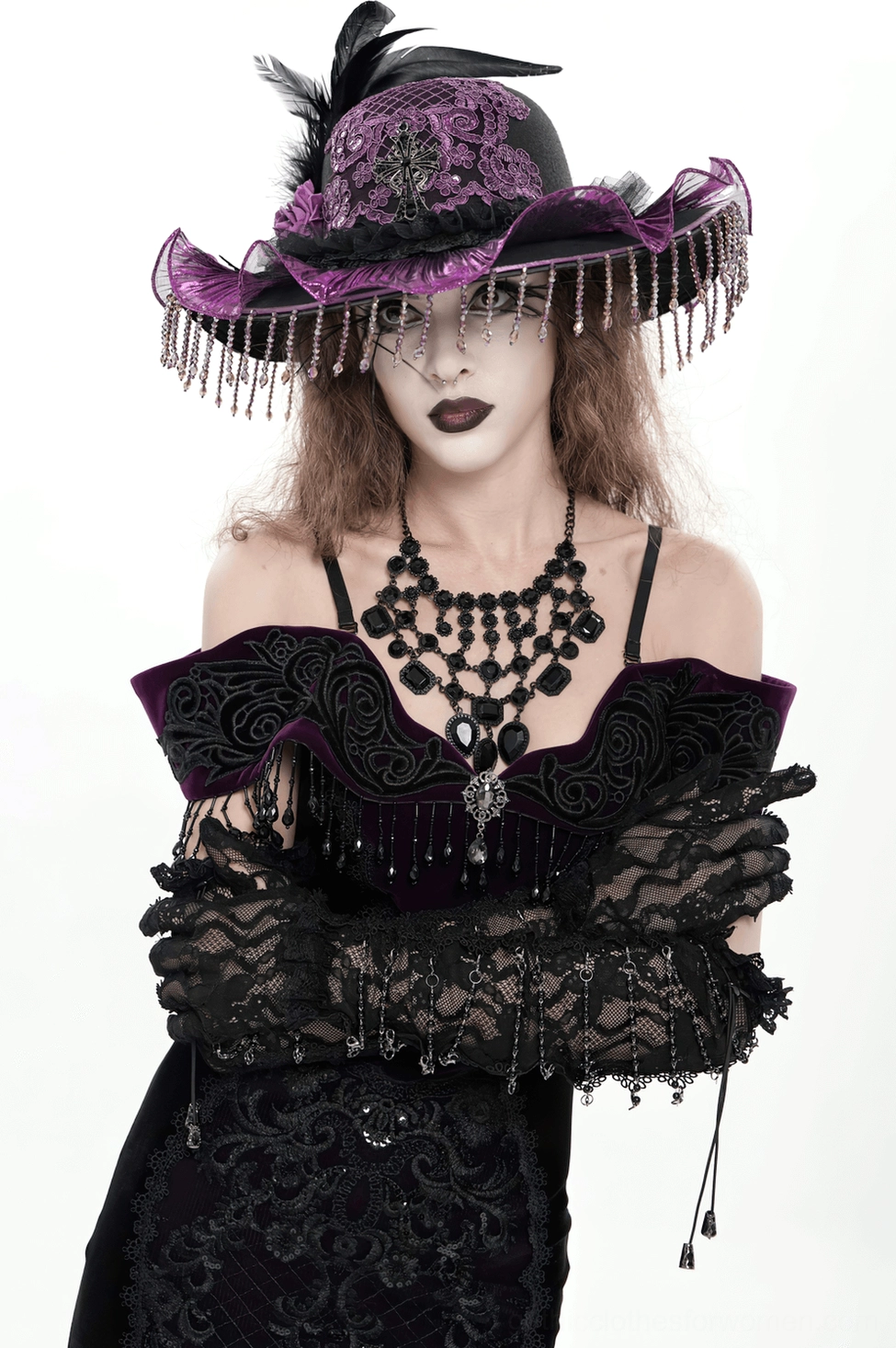 Black lace fingerless gloves flatlay showing wrist fit and upper arm coverage