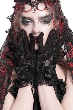 Red and black Victorian gothic lace gloves with 3D black satin roses and intricate mesh embroidery on gothic model with dark makeup