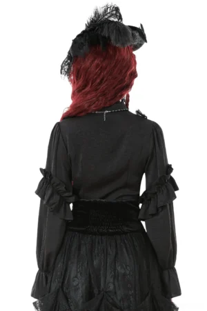 Black gothic ruffle blouse back view showing ruffled cuffs, velvet waist detail and back neck ornament on model