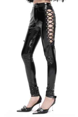 Black patent leather gothic skinny pants side profile showing lace-up cutout detail