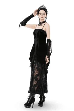 Gothic layered evening dress three-quarter side view showing sheer lace skirt overlay and velvet bodice with formal black heel boots