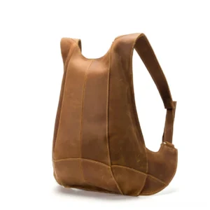 Light tan genuine leather gothic backpack rear view with vertical split leather panels and embossed texture