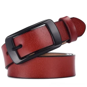 Burgundy red leather gothic adjustable belt with matte black rectangular buckle, studio flat lay