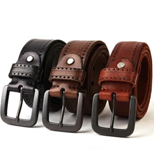 Three vintage gothic leather belts displayed flat lay - black, brown, and red genuine cowskin options with metal buckles showing embossed strap details