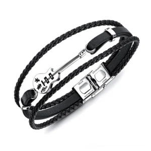 Black leather multilayer gothic bracelet with bass guitar stainless steel charm, flat overhead view