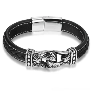 Black leather gothic bracelet with stainless steel magnetic clasp, flat lay overhead view showcasing craftsmanship