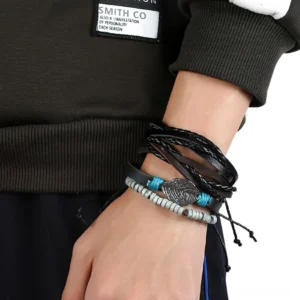 Worn adjustable gothic leather bracelet on male wrist showing adjustable knotted closure system and layered design details