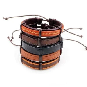 5-piece gothic leather bracelet set stacked overhead view, brown and black tones with adjustable drawstring closures, flat lay studio shot