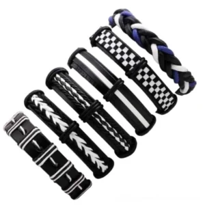 Black and white gothic leather bracelet set of 6 pieces with geometric patterns, rope braids, and hidden clasps displayed overhead view