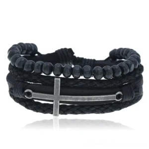 Black multi-layer gothic leather bracelet with wooden beads and antique zinc alloy cross charm, flat lay front view on white studio background