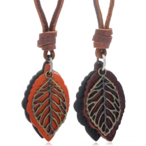 Dual genuine leather leaf pendant gothic necklace in camel and brown with bronze hollow leaf charms, front flat lay view