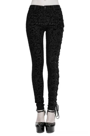 High-waisted black leggings with ankle lace-up closure and vintage scroll flocking pattern, front full view