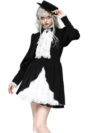 Victorian Gothic black and white lace dress front view on model - featuring high stand collar, lace jabot, long puff sleeves, and tiered ruffled skirt