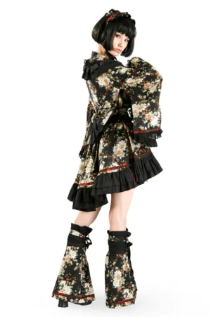 Black floral lolita dress side back view showing ruffled hem and layered tulle construction