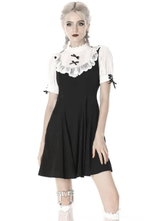 Black and white Gothic Lolita midi dress full front view with puff sleeves and lace collar on model