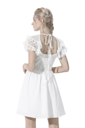 White gothic lolita mini dress back view - tie-back drawstring closure, lace ruffled sleeves, A-line skirt detail on model