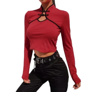 Gothic mandarin crop top with frog buttons in burgundy and black - front three-quarter view showing chest cutout and contrast trim detail