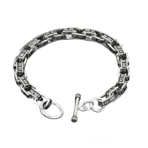 Gothic carved mantra square link sterling silver bracelet front view with toggle clasp detail