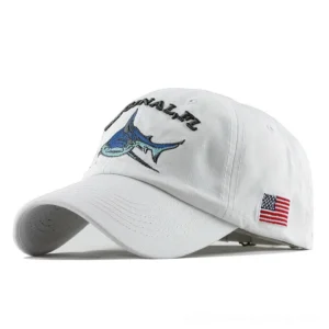 White vintage marlin embroidered gothic baseball cap with text detailing and American flag patch accent