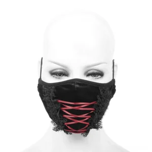Gothic black velvet face mask worn on mannequin head, front-facing view displaying red lace-up corset design and intricate black lace edge detailing