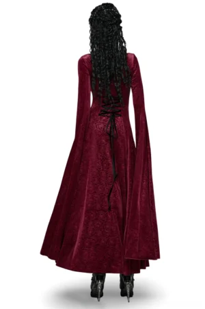 Gothic maxi dress back view showing ornate black lace-up corset back detail and dramatic flowing sleeves on model
