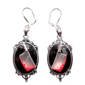 Gothic bloody meat cleaver earrings with black gemstone in ornate silver vintage frame, front flat view
