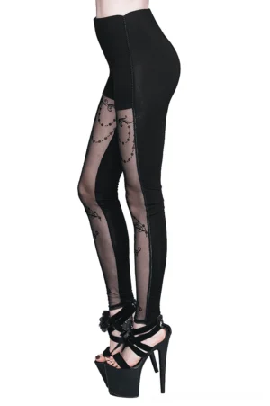 High-waisted black gothic leggings with sheer mesh design, side profile view showing silhouette and elastic waistband on female model