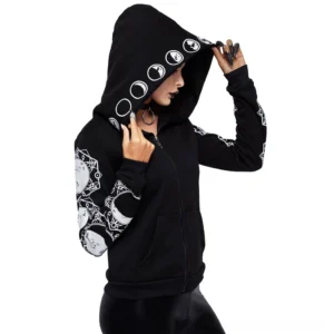 Women's black gothic zip-up hoodie with celestial moon phase sleeve prints, front three-quarter view on goth model