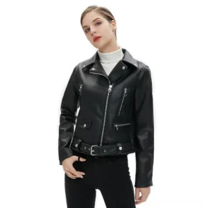 Black gothic moto jacket front view on model showing faux leather texture, adjustable waist belt, and asymmetrical zipper closure