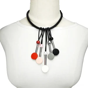 Gothic multicolor beaded silicone choker with dangling pendants displayed on white mannequin upper body
