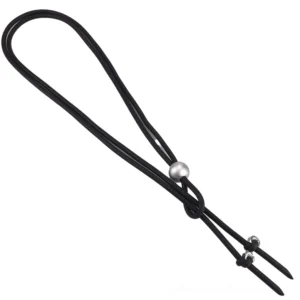 Adjustable punk gothic necklace with black rubber cord and metal adjusters flat lay top view detail