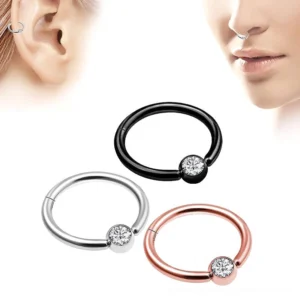 Multiple color options of hinged clicker nose ring - silver, black, and rose gold stainless steel crystal segment hoops displayed on model showing wearing effect