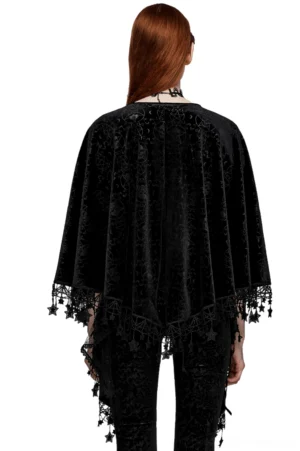 Gothic velvet cape with embossed occult patterns and flexible star tassels shown from back view on model