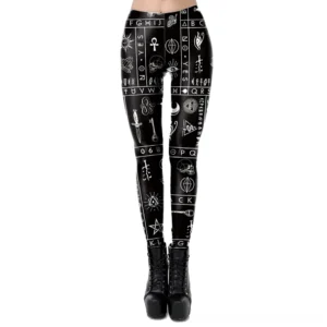 Women's black gothic leggings featuring all-over white mystical print patterns, front lower body view with black lace-up boots, punk alternative fashion