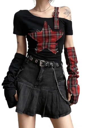 Asymmetric gothic patchwork crop top with pentagram and red tartan plaid, worn by female model in front three-quarter view with matching arm sleeve warmers