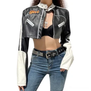 Black and white patchwork cropped gothic biker jacket front oblique view on model, featuring girl embroidery and color block design