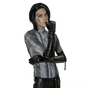Black patent leather gothic gloves with detachable chain worn by tattooed male model, three-quarter view showing glossy finish and wrist chain detail